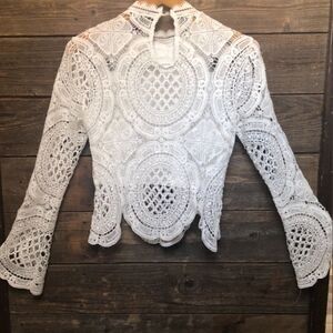 It’s pink brand bohemian style WHITE crop top with flared sleeves